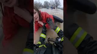 Firefighter Hero Saves Flood Victim!