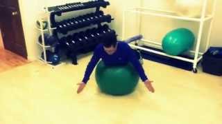 Rotator cuff strengthening exercises on Swiss ball