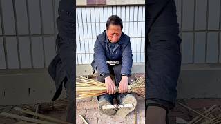 Making broomcorn brooms: A traditional craft typically used for sweeping and decoration