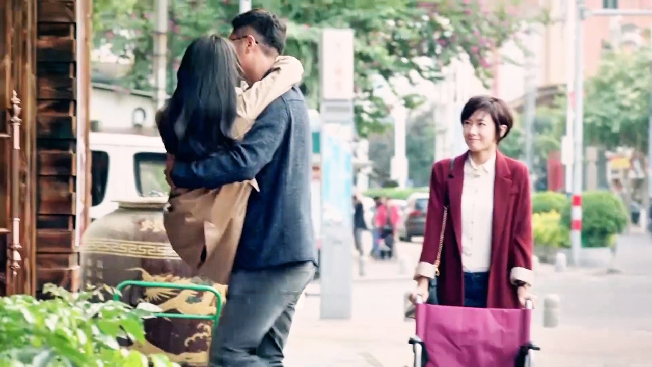 Mistress taunts wife in husband's arms. Wife's cold smile reminds her to know her place in the home.