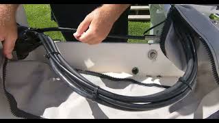 Installation of fabric rigging sleeve for outboard motor.