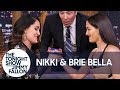 Nikki and Brie Bella Compete in the Tonight Show's Thumb Wrestling Championship