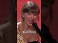 Taylor Swift performs with Randy Newman at the "Toy Story 5" premiere. (🎥: Walt Disney Pictures)