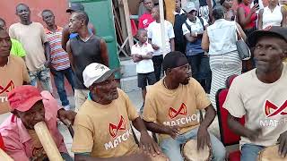 Konbit of scraping maniocs in Haiti