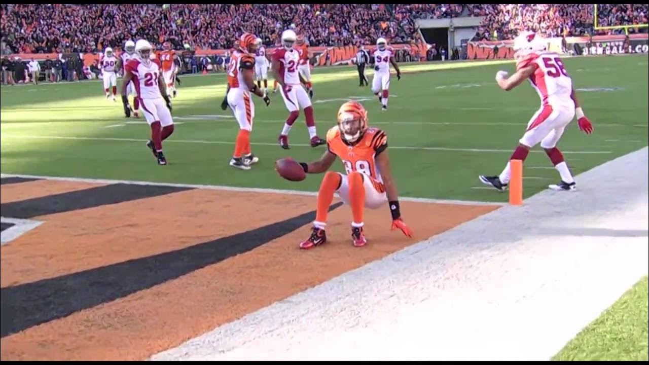 BENGALS FOOTBALL PLAYER FLIPS OVER DEFENDER TO SCORE A TOUCHDOWN