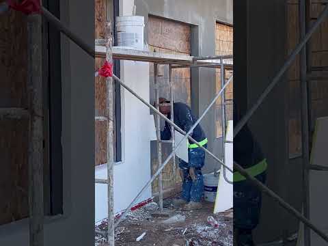 Applying stucco color