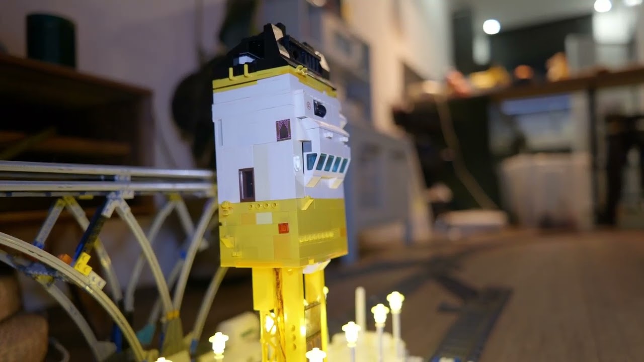 Mechanic Lego Jazz for study with yellow train station