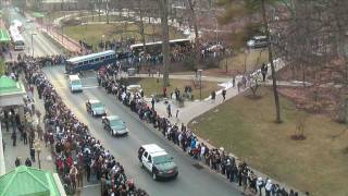 Paterno crosses campus for the last time during funeral procession.
