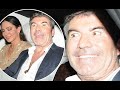Simon Cowell grimaces with panic as he is asked when he'll propose to girlfriend Lauren Silverman -