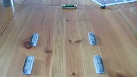 Roller can travel any distance through a series of Halbach arrays