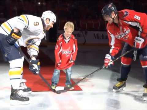 Sick Kid Drops the Puck