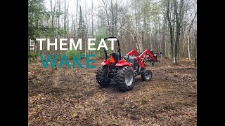 PLANTING A DEER FORAGE PLOT...DEEP FOREST...MAHINDRA 1640 WITH GRAPPLE DOING WORK.