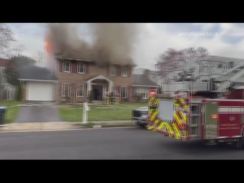 Firefighters battle house fire in Fairfax County - YouTube