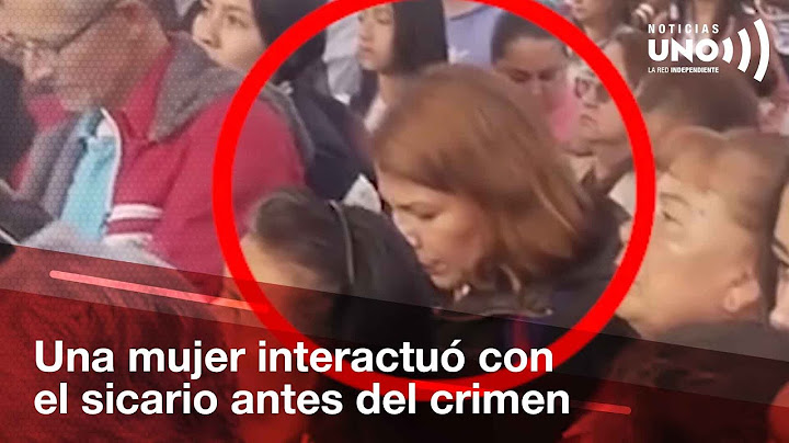 The hitman interacted at the demonstration with a woman who saved the position from which he fired.