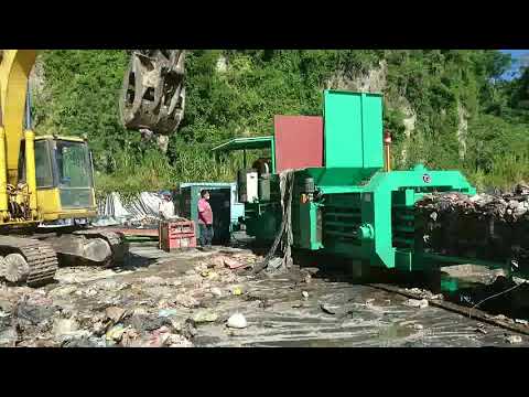 Feeding waste into TB-091150 - YouTube