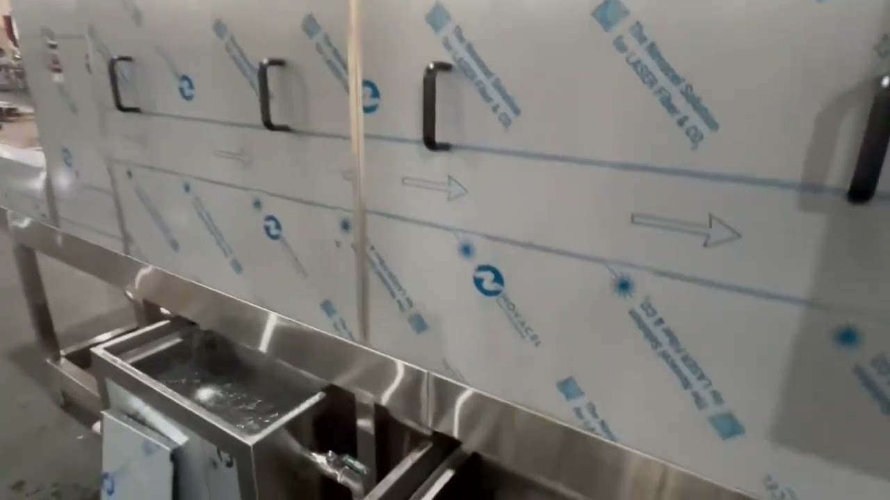 Tray/container washing machine