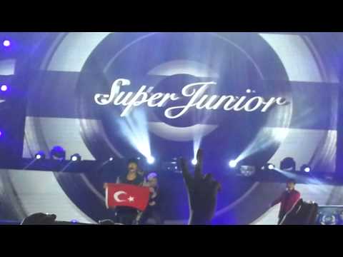 @ the end of Music Bank Istanbul -  Donghae takes the Turkish flag