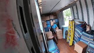 What Are The Movers Doing Inside The Trailer?