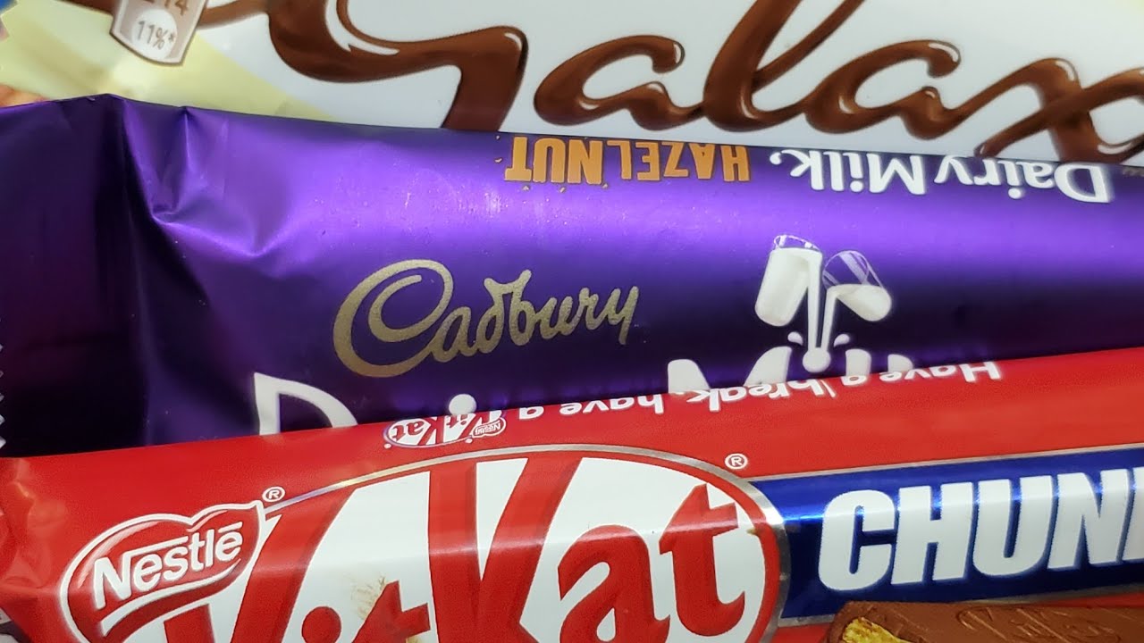 Some LOT'S of yummy chocolate and candies, Cadbury, kit kat GODIVA