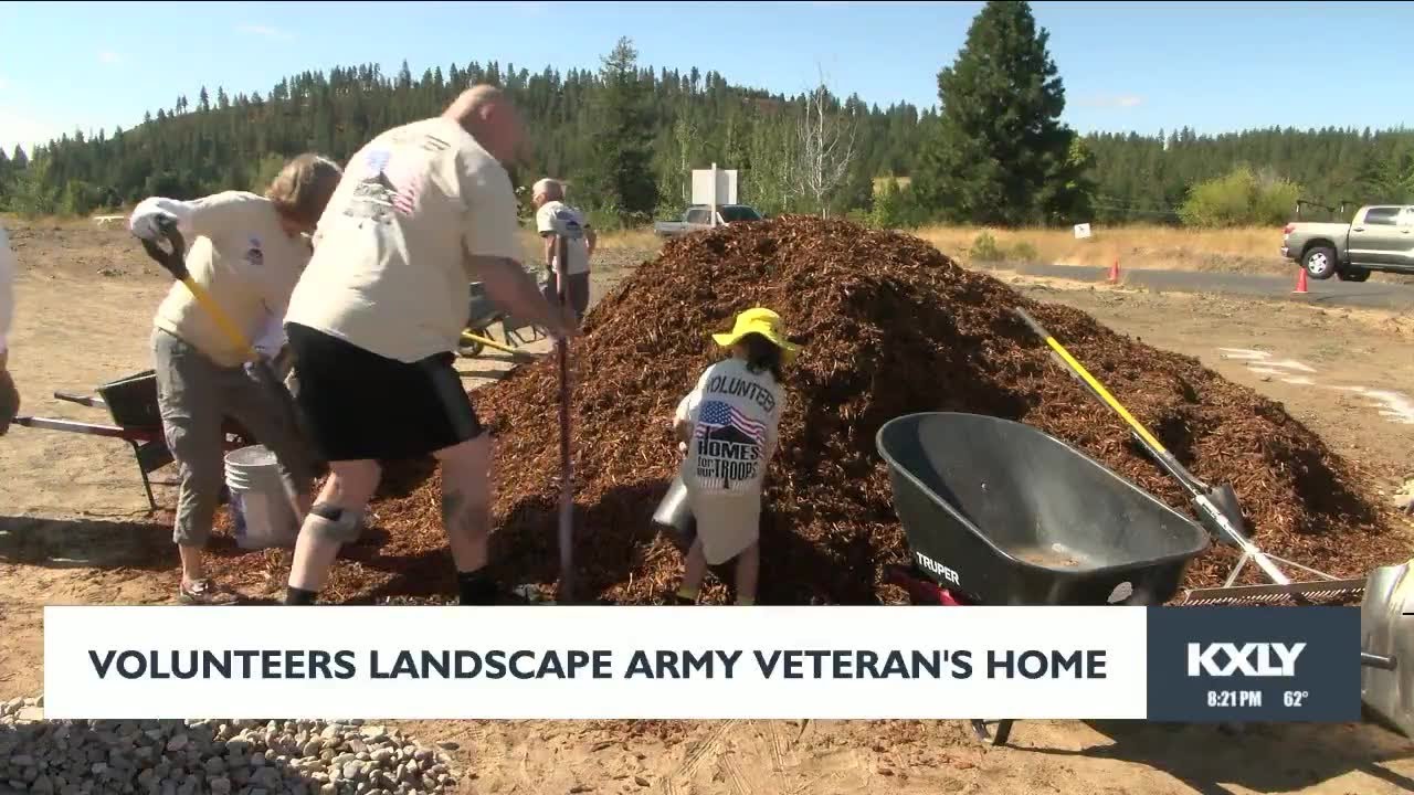 Volunteers landscape Army veteran's new home