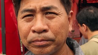 No bathrooms and 24-hour shifts -- the life of a Hong Kong dock worker