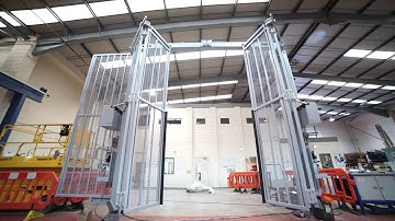 Bespoke Trackless Bi-Folding Gate w/ Top Rack & pinion