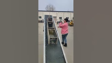 Folding belt conveyor transports goods of various shapes, loading, stacking