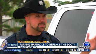 Out with the boot and in with the barnacle New parking enforcement device being tested in Colorado