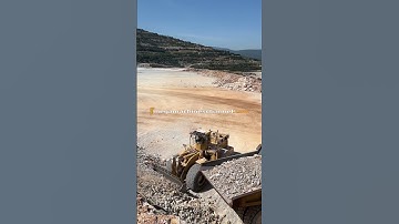 Cat Wheel Loader Loading Aggregates On Cat Dumper!