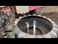 How to turn an old tire into a water tank for cows!
