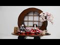 オレンジ桜花柄衣装の雛人形丸太親王飾り