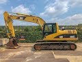 Caterpillar 320CL 2004 excavator moving and demonstration