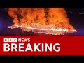 Iceland volcano erupts near village | BBC News image