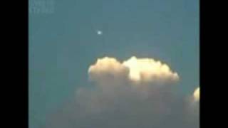 ufo in mexico hovers over cloud
