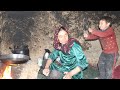 Young mother cooking winter food in the cold weather in the cave   afghanistan village life
