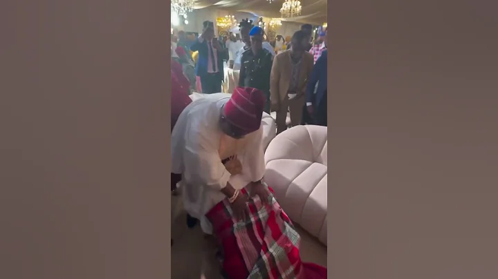 Davido Hugs his Dad and Prostrates for Governor Adeleke his uncle