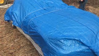 tarp a car so the WIND doesn’t blow it off (years of trial and error)