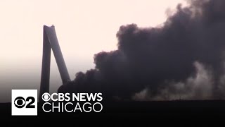 Windmill catches fire after being bent by tornado in Iowa