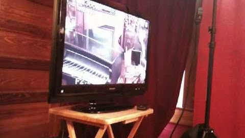 Video of monitor showing dolly cam view of person holding the iPhone