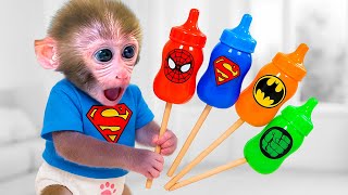 El mono Bon Bon recoge frutas y disfruta de refrescos burbujeantes de una máquina expendedora