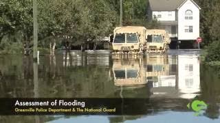 Greenville Police assess flooding with The National Guard.