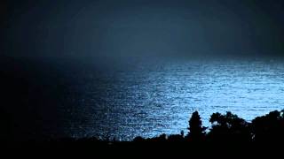Pacific Ocean water shimmer hazy sunset timelapse 1 V10542