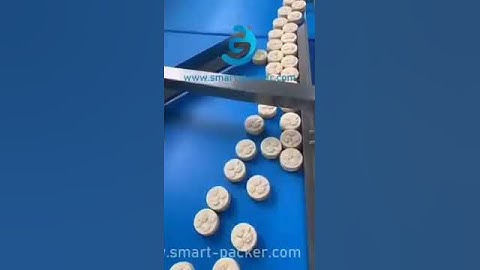 Mook cake sorting conveyoir feeding tray filling packing machine high speed video