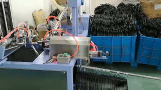 Automatic clothes hanger hook inserting machine