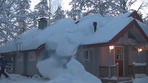 Using A Rope To Remove Snow From Roof
