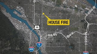 Crews battle house fire in NE Portland