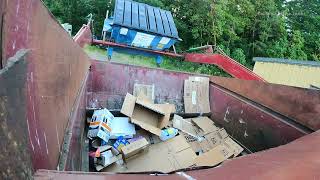 Front Loader Crushing a Cardboard Route