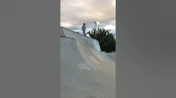 7 year old Julian drops in on high ramp