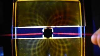 passing 1 magnet down through a  slot cell