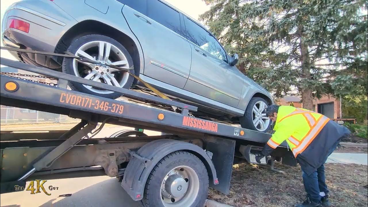 Mississauga Towing a vehicle out of the front yard garden of home 216